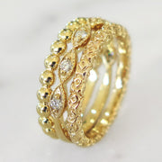 Set of three stacking rings in yellow gold. DANA WALDEN NYC.