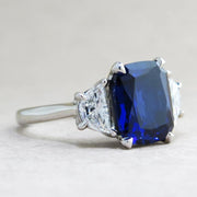 Blue sapphire engagement ring with half moon diamond accents in platinum - side profile - Alexandra
