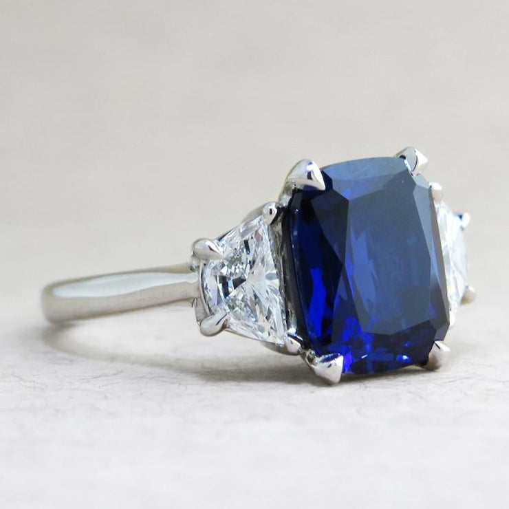 Blue sapphire engagement ring with half moon diamond accents in platinum - side profile - Alexandra