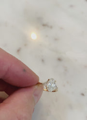 VIDEO Lucine oval cut diamond 3 stone engagement ring in yellow gold with trillion side stones .
