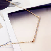 Diamond bar necklace by Dana Walden Bridal- Diamonds and 14K rose gold.
