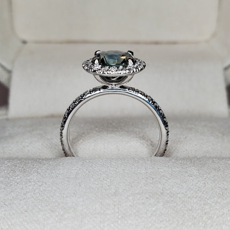 SIDE VIEW: Blue-green sapphire engagement ring with white diamond halo- unique wedding jewelry by Dana Walden