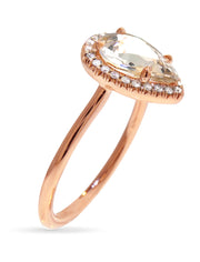 pale peach pear sapphire engagement ring in rose gold halo, side image, designed by dana walden bridal in nyc