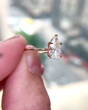 VIDEO 1.5 carat pear-shaped lab created diamond engagement ring set in yellow gold. DANA WALDEN BRIDAL.