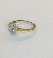 Video of a yellow gold engagement ring with Aquamarine and diamonds. DANA WALDEN NYC.
