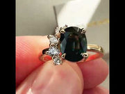 Video Teal sapphire engagement ring with diamond demi halo set in yellow gold. One of a kind. DANA WALDEN BRIDAL.