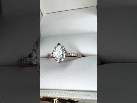 Video of Milly 1.01 carat lab grown diamond engagement ring with thin diamond micro-pavé band and low set diamond in sustainable 14k rose gold with compass NSEW claw prongs in ring box