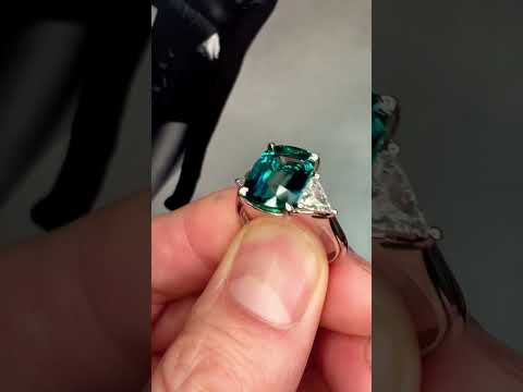 Video Natural Teal 5.11 Carat Sapphire 3 Stone Engagement Ring In Platinum with Triangle Natural Diamond Accents - Side View