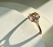 Romy 1.00 Ct Natural Pale Pink Sapphire Three Stone Engagement Ring in Yellow Gold