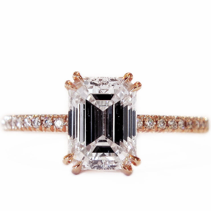 Conflict-free ethical emerald cut diamond set in rose gold with micropave band. Dana Walden Bridal.