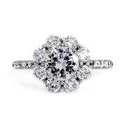 Chunky diamond halo engagement ring named Kendall. Made in NYC using conflict-free diamonds. Dana Walden New York City.