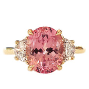 Unique padparadscha pink sapphire engagement ring by DANA WALDEN BRIDAL.