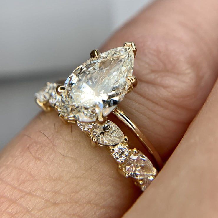 Pear-shaped diamond solitaire with diamond band- DANA WALDEN BRIDAL.