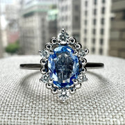 Terry Light Blue 0.80 Carat Natural Sapphire & Diamond Halo Engagement Ring