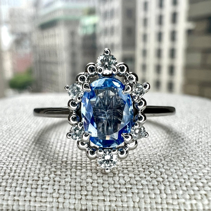 Terry Light Blue 0.80 Carat Natural Sapphire & Diamond Halo Engagement Ring