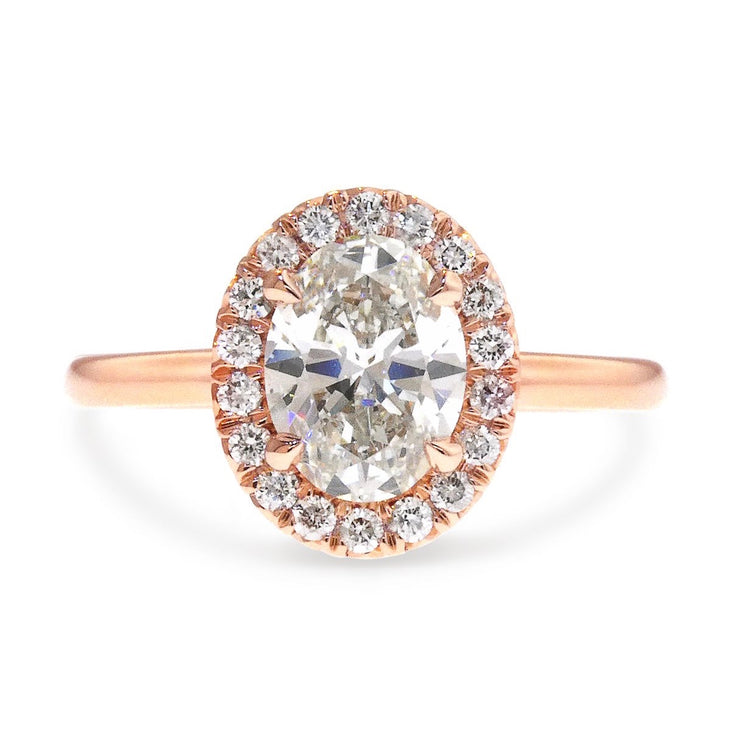 Unique rose gold lab diamond halo engagement ring by DANA WALDEN.