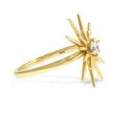 Handmade sculptural starburst ring in yellow gold with 0.25ct diamond center stone. Handmade by Dana Walden Bridal Jewelry NYC.