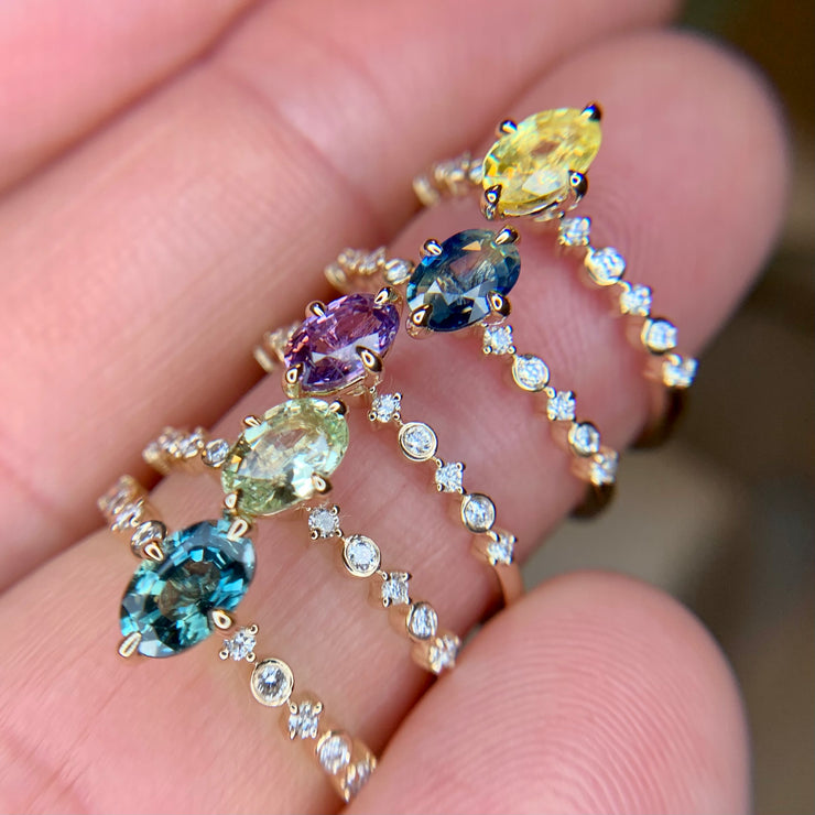 Unique colored sapphire engagement rings with delicate diamond accent bands by Dana Walden Bridal, NYC