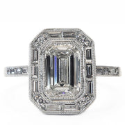 Elena emerlad-cut diamond halo engagement ring with DANA WALDEN BRIDAL. Made in New York City.