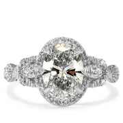 Maiya platinum oval diamond halo engagement ring. Dana Walden Bridal NYC.