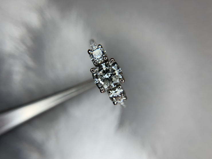 Three stone diamond engagement ring by DANA WALDEN 