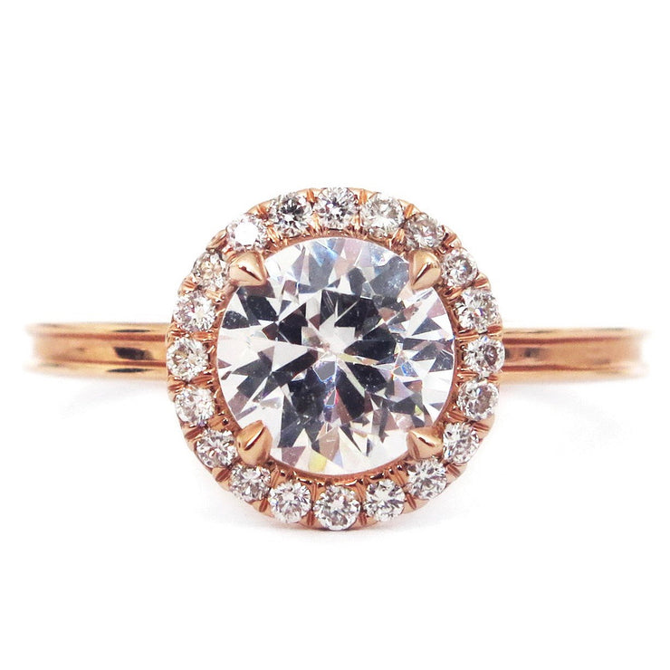 Unique, perfect diamond halo engagement ring with beveled band in rose gold. DANA WALDEN NYC.