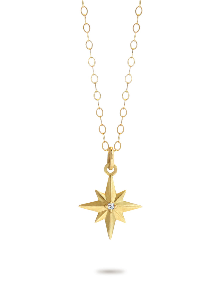 yellow gold and diamond golden compass necklace by dana walden nyc