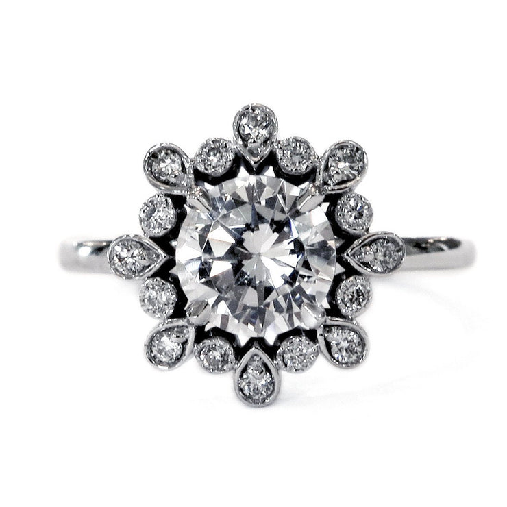Diamond halo engagement ring with truly unique design. By Dana Walden Bridal in NYC.