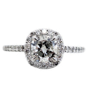 Cushion cut diamond halo enggement ring with conflict-free ethical diamonds. Dana Walden Bridal NYC.