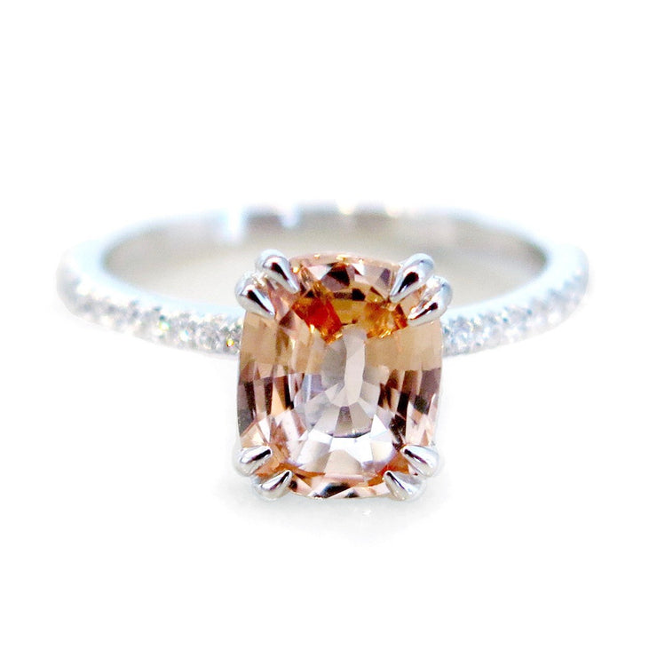 Peach sapphire engagement ring set in platinum. Ethically handmade in New York City. Dana Walden Bridal.
