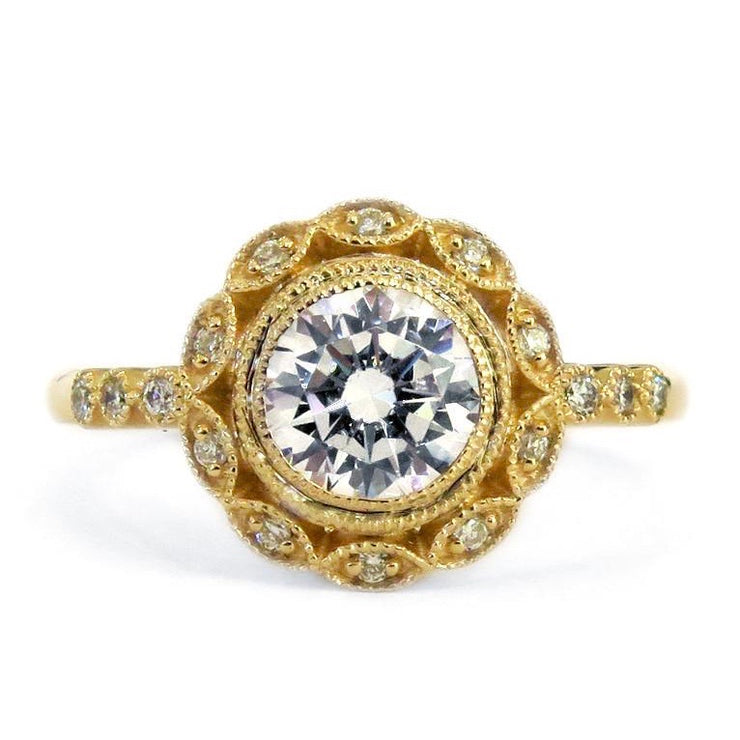 Ornate yellow gold diamond halo engagement ring with milgrain details. Dana Walden NYC.