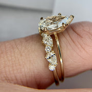 Pear-shaped diamond solitaire with diamond band- DANA WALDEN BRIDAL.