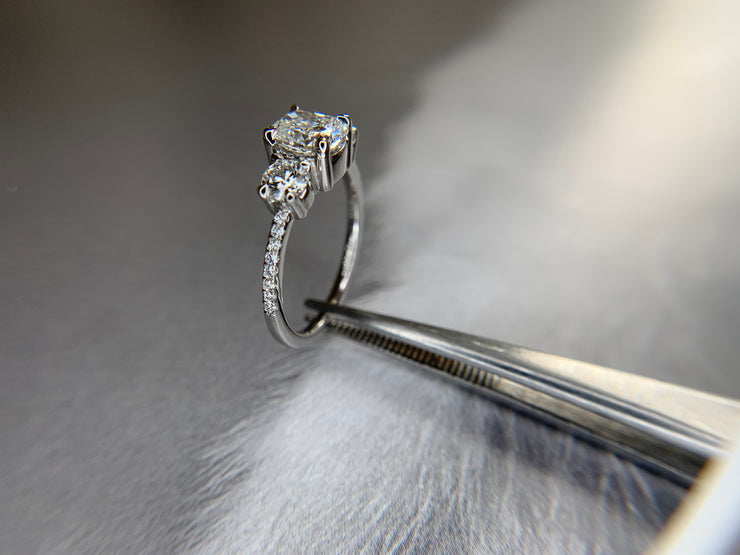 SIDE VIEW Dana Walden three stone engagement ring.