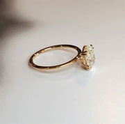Side view JESSA oval solitaire engagement ring by DANA WALDEN BRIDAL.