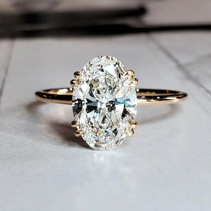 Oval Diamond Halo Engagement Ring With Pear-Shape Diamond Si | Reed & Sons  | Sedalia, MO