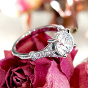 Floral-inspired engagement ring with ethical diamonds set in white gold.