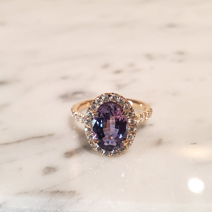 Bi-color purple sapphire engagement ring by Dana Walden Bridal.