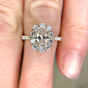 Ethical diamond halo engagement ring set in yellow gold. Handmade by Dana Walden Bridal Jewelry.