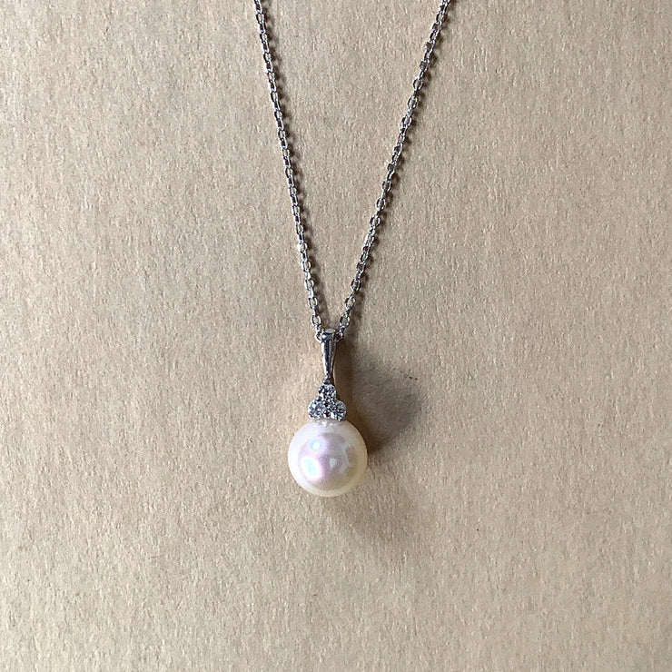 Handmade fine jewelry by Dana Walden Jewelry. White gold, pearl, and diamond necklace ships in 2-3 days.