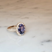 Bi-color purple sapphire engagement ring by Dana Walden Bridal.