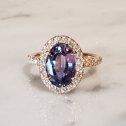 Bi-color purple sapphire engagement ring by Dana Walden Bridal.