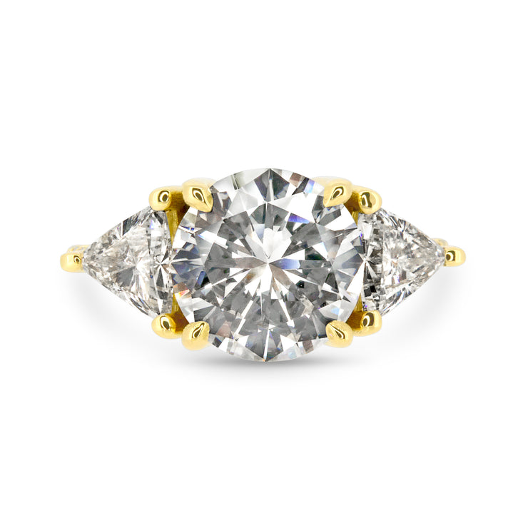 Three stone natural diamond engagement ring by DANA WALDEN BRIDAL.