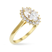 SIDE VIEW: Oval diamond halo engagement ring with tipped prongs in yellow gold. DANA WALDEN NYC.
